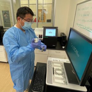 Sean Wang, Minnesota Department of Health Public Laboratory Division, works in the laboratory.