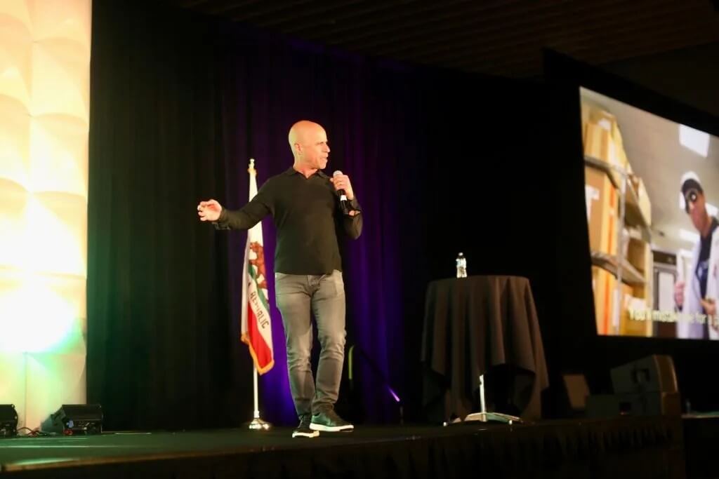 Keynote speaker Zubin Damania speaks on stage.