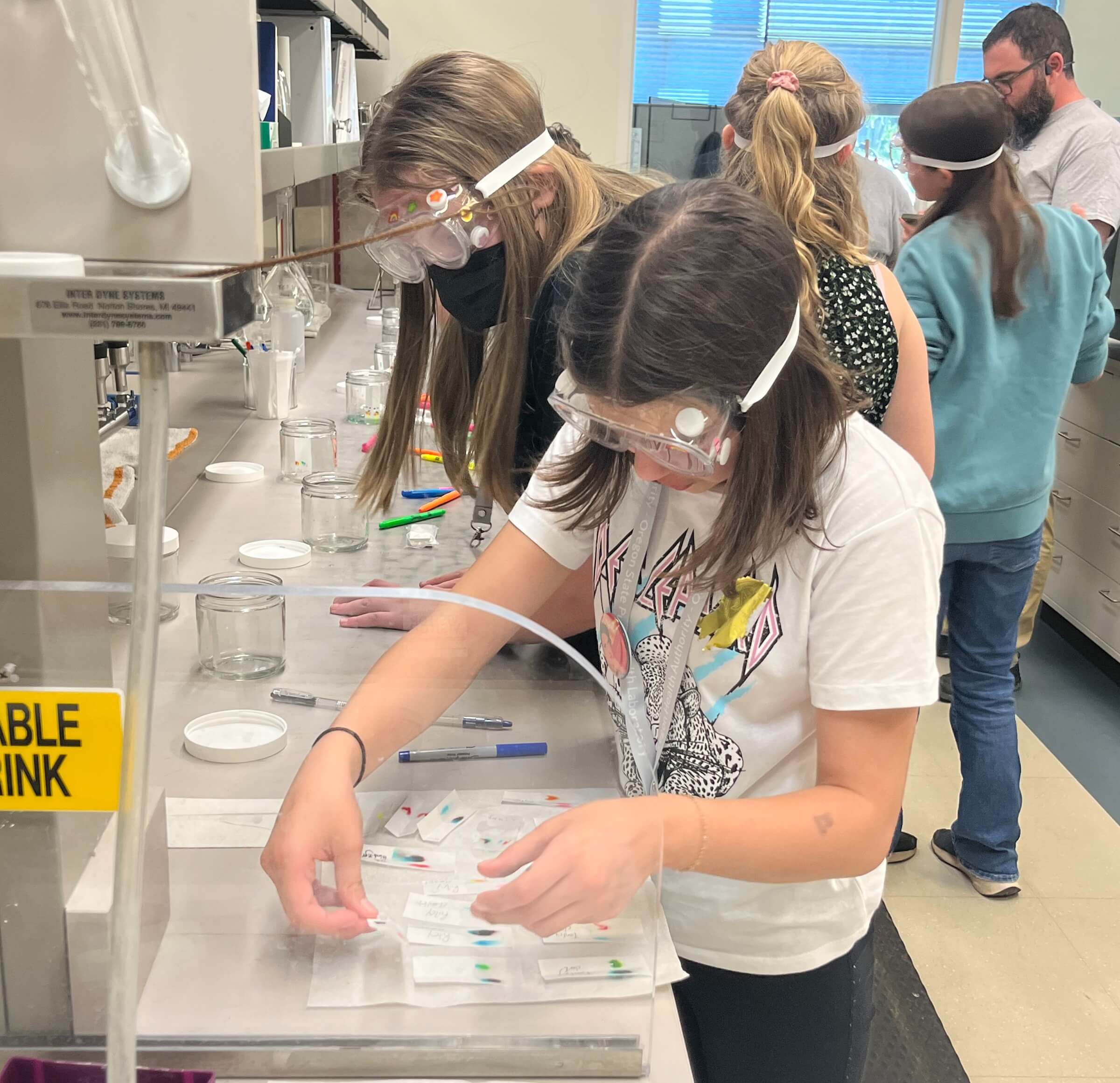 Students in a laboratory during an outreach event