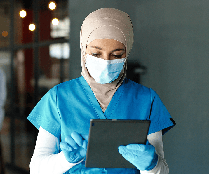 Female doctor using a tablet