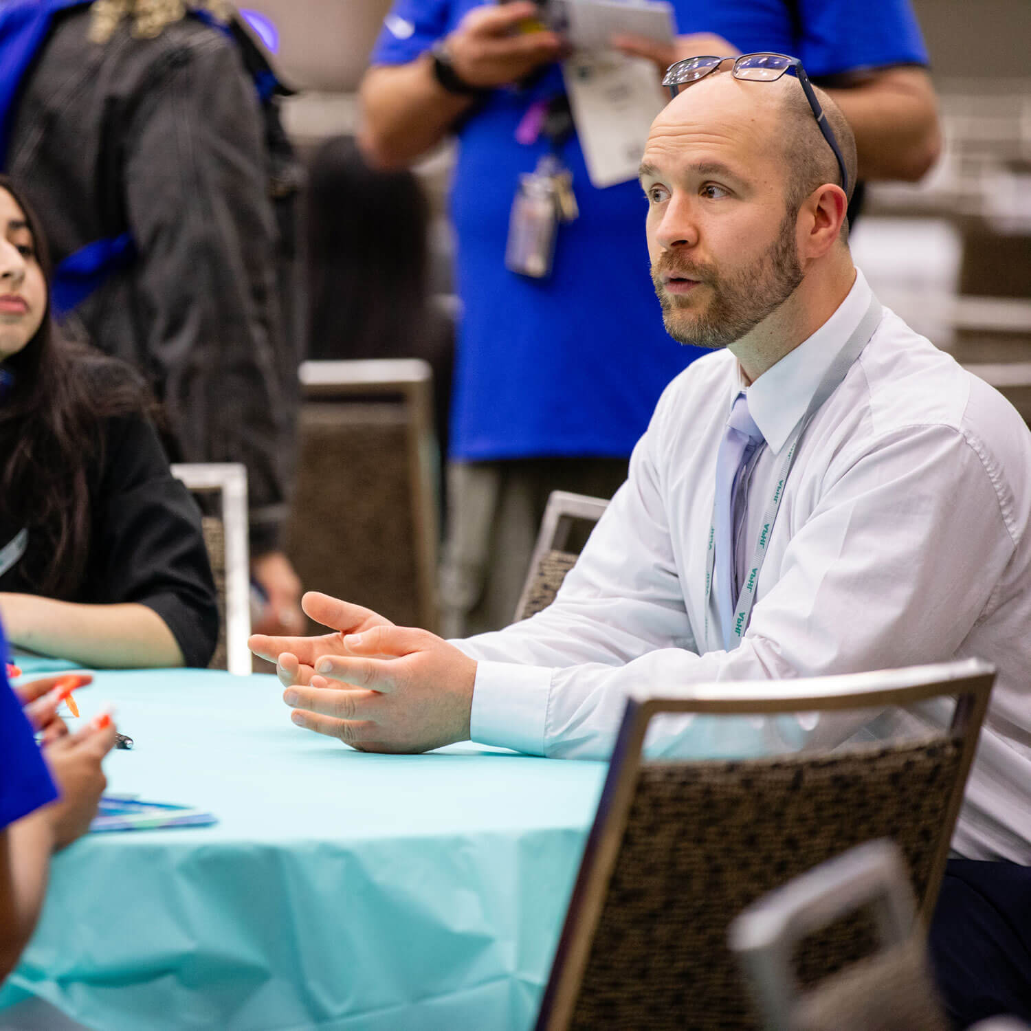APHL Mentor chats with interns during APHL 2026.
