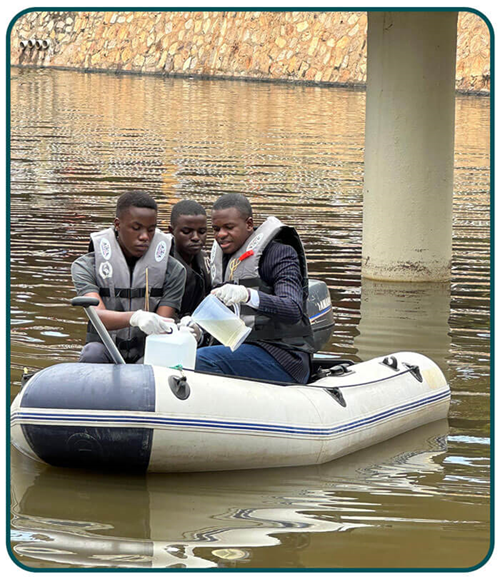 Uganda team members gather water samples for pathogen testing. Photo: Ceres Nano.