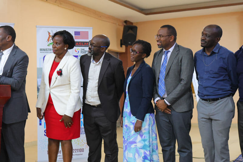 Commissioners Paul Mbaka and Susan Nabadda looks on as Director Olalo Officially launches the LDR.