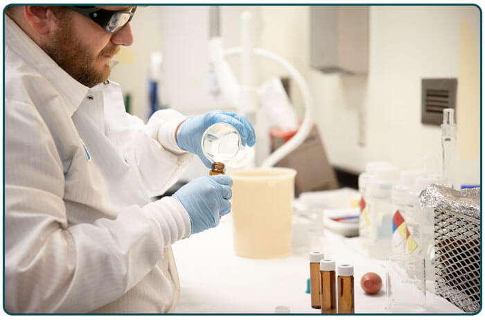 7-MEM-SC-Environmental-04-chemist-samples-organics SCDES Chemist Benjamin Walters prepares samples in the Volatile Organics Laboratory