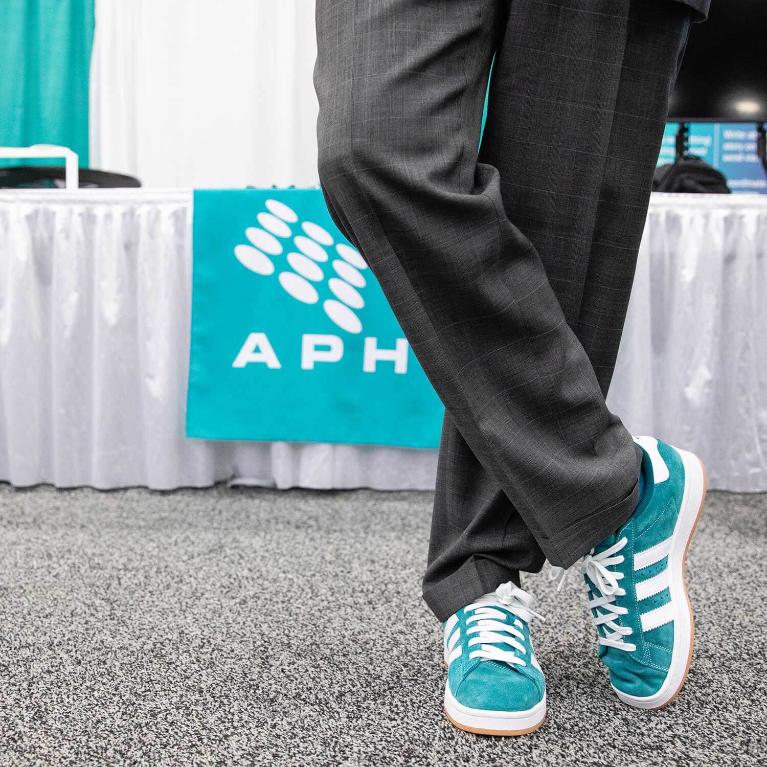 APHL President Scott Shone's on-brand shoes at APHL 2026.