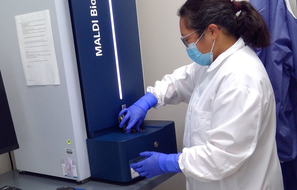 Staff working at the Napa-Solano-Yolo-Marin Public Health Laboratory.
