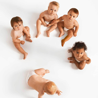 group of five babies looking up at camera