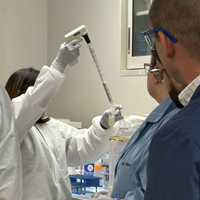 An instructor demonstrates how to remove supernatants from a PIF enrichment.