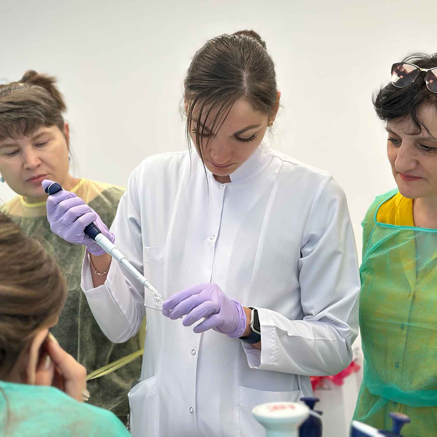 Svetlana Colac, of Moldova's National Agency for Public Health, demonstrates dilution of sequencing libraries during a PulseNet Eastern Europe Central Asia training workshop.